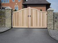 A Matlock style hardwood gate made with Iroko and treated with teak oil