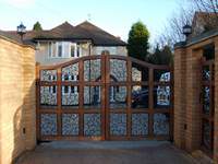 A Mickleover gate is a varient of the Uttoxeter gate with scroll infill instead of bars